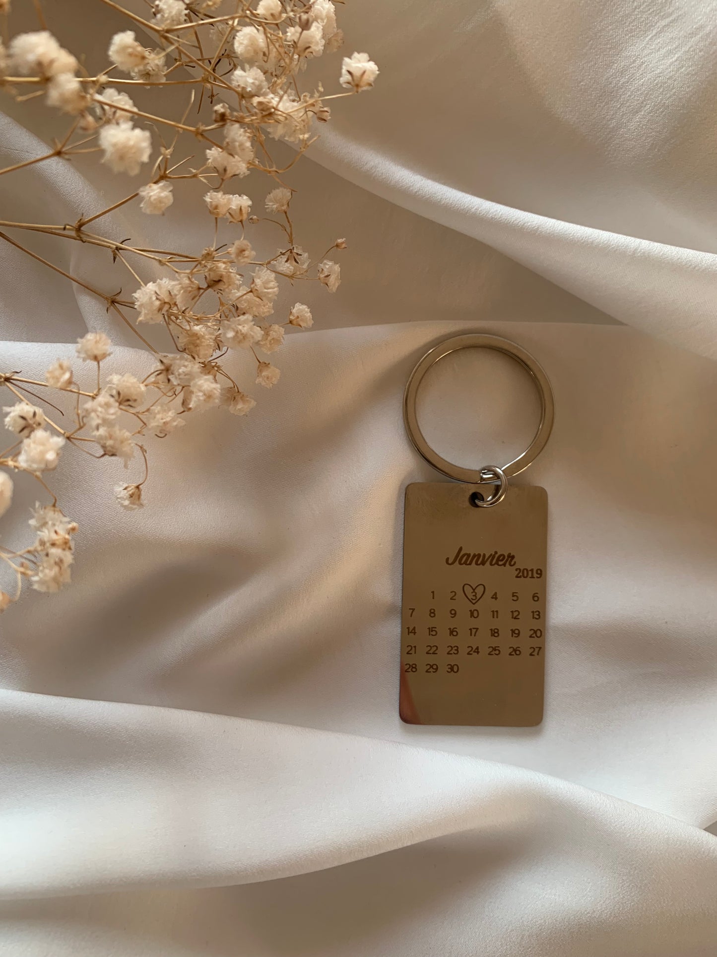 Porte clé date