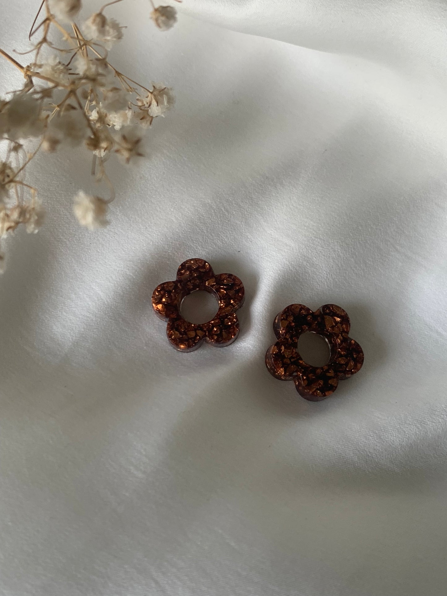 Fleurs imparfaites pour créoles