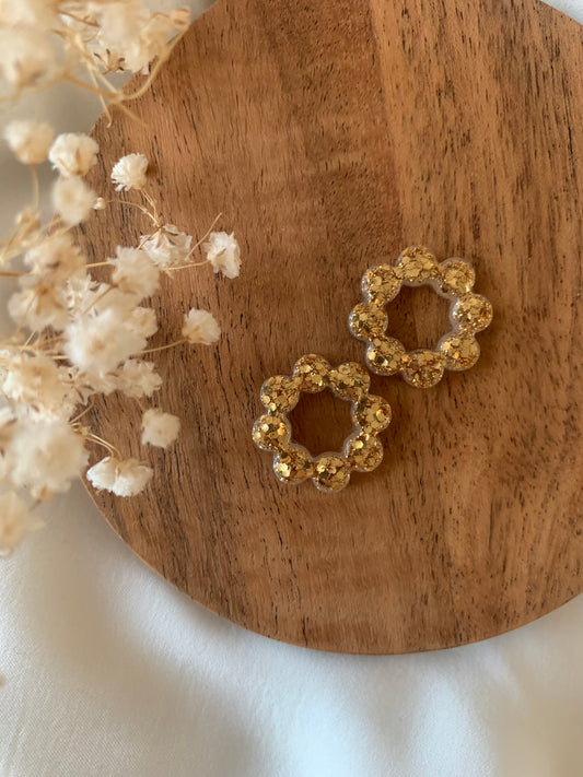 Fleurs pour créoles dorés